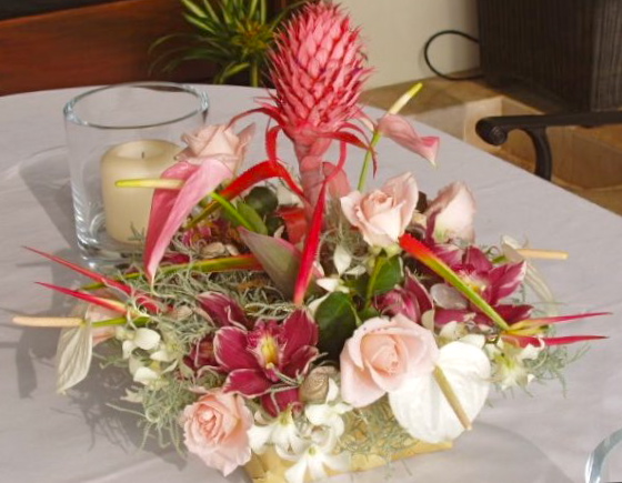 centerpiece pineapple roses orchids  anthuriums.jpg