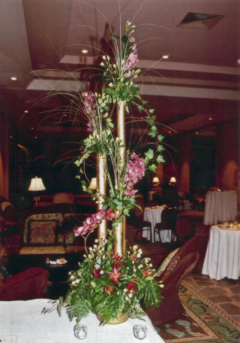 dramatic tiered arrangement for wedding or event.jpg