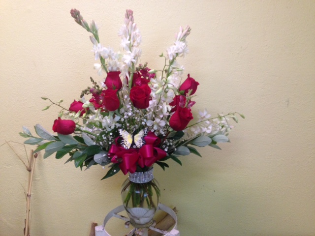 rose arrangement with tuberose and orchids 2.jpg